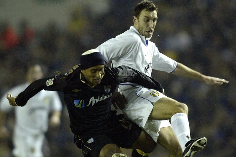 Jason Wilcox challenges Malaga's Marcelo Romero during the UEFA Cup third round second leg clash at Elland Road in December 2002.