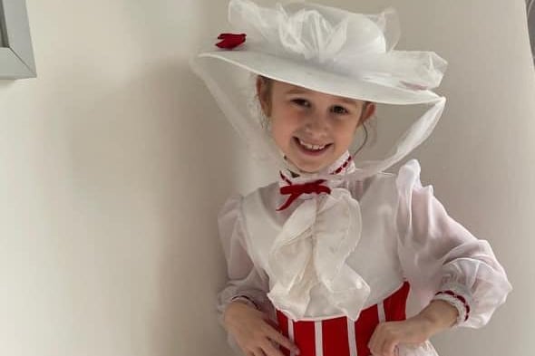 Ella Stott, six, as Mary Poppins.