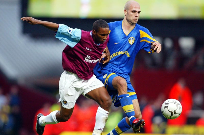 Teddy Lucic battles for the ball with West Ham United's Jermaine Defoe.
