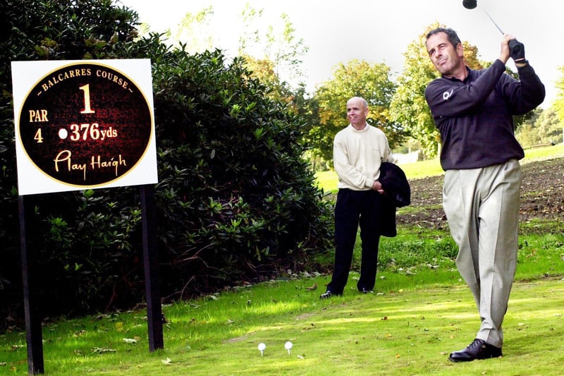 Ryder Cup captain, Sam Torrance, driving at the first hole watched by club professional, Ian Lee, at the official opening of Haigh Hall Golf Complex on Monday 8th of October 2001.