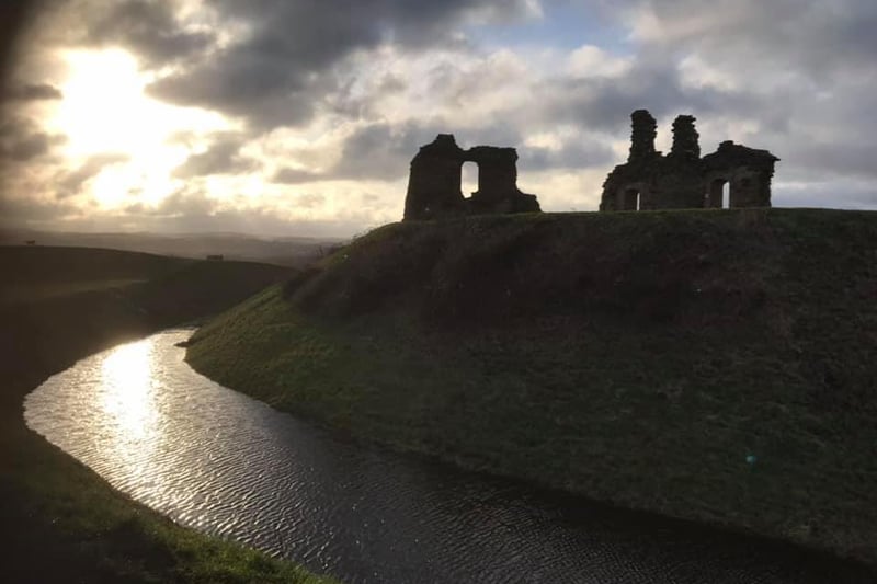 Richard Allen's sunset photo of Sandal Castle was topped off by a moat filled with water and unusual cloud formation.