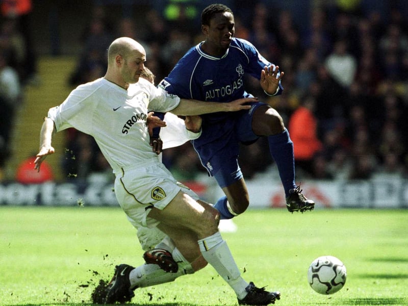 Danny Mills tussles with Chelsea's Celestine Babayaro.