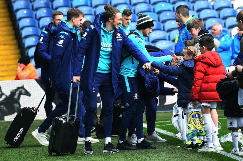 No handshakes allowed, but fist bumps for the kids ahead of kick-off...