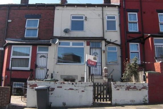 This two-bedroom terraced house is for sale in Hudson Place in Harehills. It is a back-to-back terrace with a lounge, kitchen, basement, cellar and bathroom. It is on the market for £77,995 with ASK.
