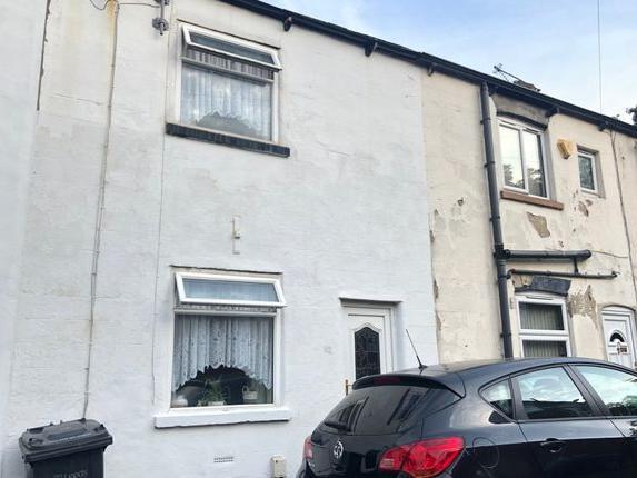 This one-bedroom terraced house is for sale in Moorfield Road in Armley. It has a basement, kitchenette, living room, one bedroom and bathroom. It is on the market for £79,950 with Brooklands Robinson.