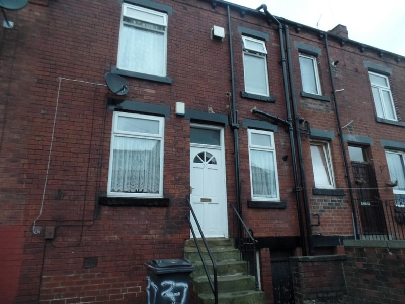 This two-bedroom terraced house is in Conway Drive in Harehills. It is a back-to-back terrace with two double bedrooms and a bathroom upstairs. It is on the market for £80,000 with Moorland.