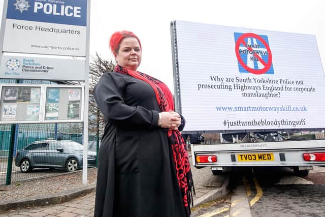 Claire Mercer, whose husband Jason was killed along with Alexandru Murgeanu when they stopped on a section of smart motorway on the M1 near Sheffield after a minor collision and were then hit by a lorry, protests outside South Yorkshire Police HQ in Sheffield, where she is calling on the chief constable to prosecute Highways England over her husband's death. Photo: PA