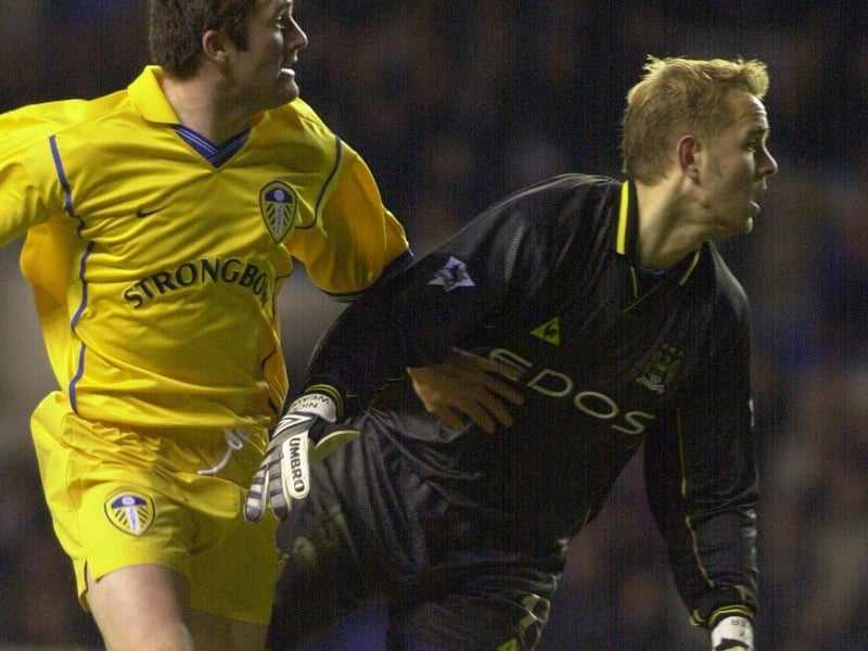 Robbie Keane gets the better of Manchester City goalkeeper Nicky Weaver to score during the Premiership clash at Maine Road in January 2001. He bagged a brace as Leeds won 4-0.