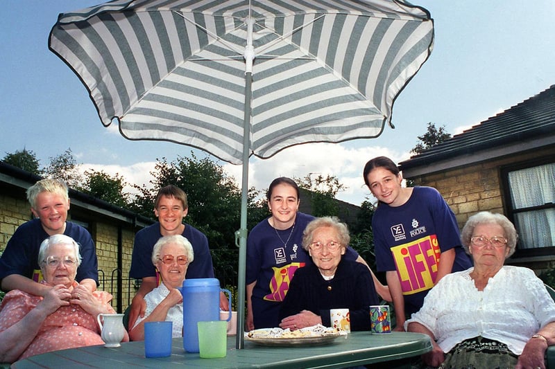 Pupils from Woodkirk High took part in a project to raise funds to provide garden furniture for the residents of Siegen Manor in Morley. Pupils, pictured with residents are, John Nall, Jonathan Harrison, Laura Kurij and her sister Nina Kurij.