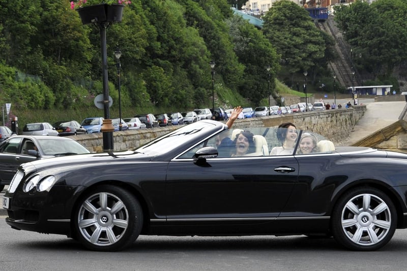 One of the flash cars used to arrive - a Bentley Continental convertible.