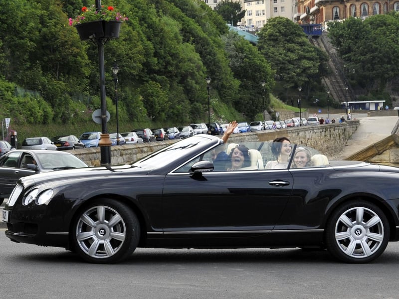 One of the flash cars used to arrive - a Bentley Continental convertible.