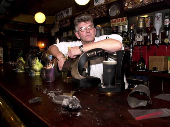 Geoff Franks, landlord of The Monkswood Pub looks at the damage to his bar after a suspected arson attack. PIC: James Hardisty