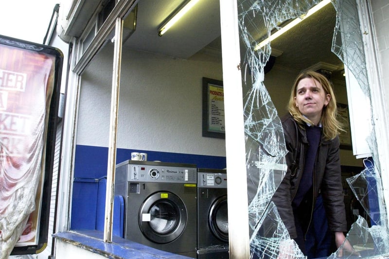 June 2001 and the big clean up was underway after a night of rioting in Harehills. Pictured is Samantha Davies, a worker at Spic Launderette on Harehills Road which was wrecked.