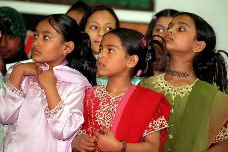 July 2001 and youngsters from the Shantona Homework club perform Bangladeshi songs at the open day held at the Shantona Woman's Centre in Harehills.