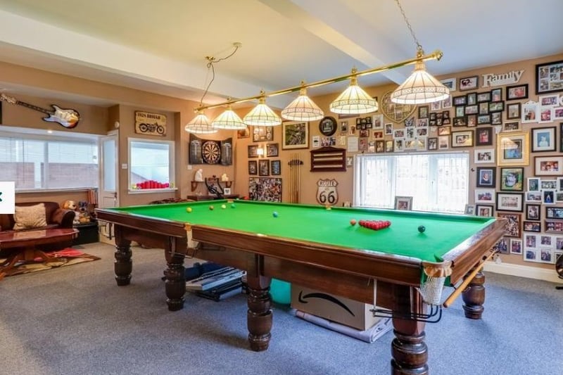 Currently used as games room with snooker table, but could be used for a variety of uses such as second lounge, further bedroom or office. Two UPVC double glazed windows (to the side and front), two central heating radiators, t.v. point and wall lighting. Single glazed door providing access to the staircase leading to the swimming pool. Single glazed timber windows overlooking the pool.