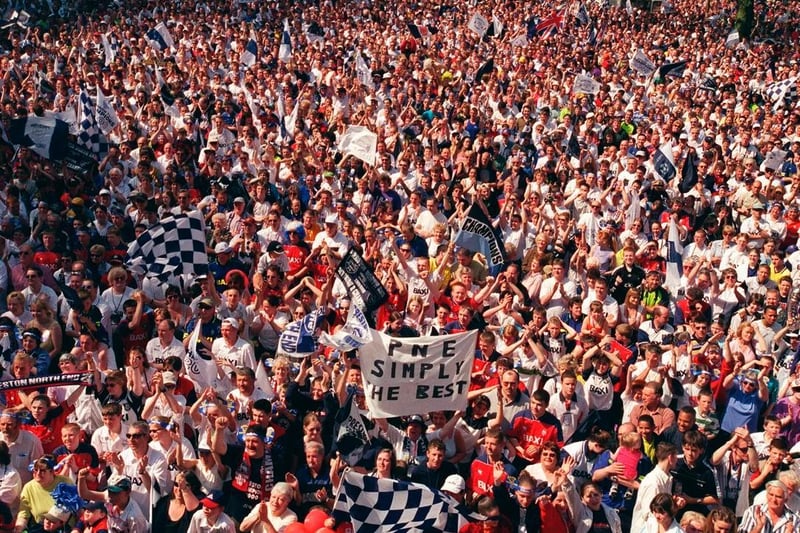 Fans celebrate PNE's promotion on the Flag Market in 2000