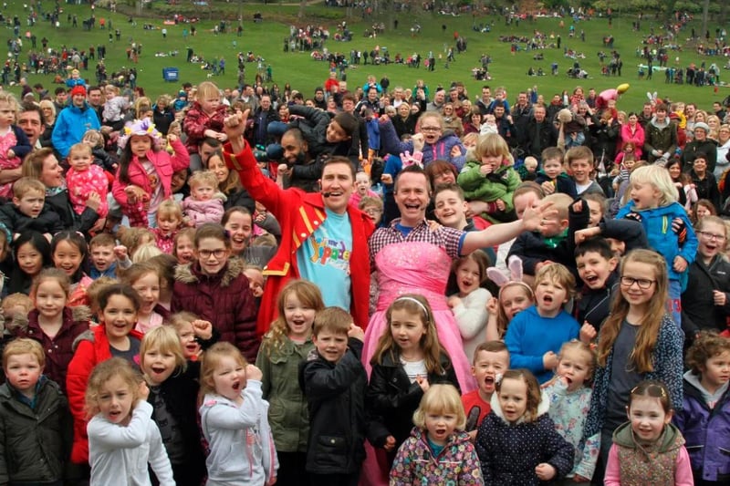 Pictured are the crowds enjoying the fun by performers Mr Yipadee and Alex Winters from CBeebies during Egg Roliing at Avenham Park Easter Fun Day in April 2015