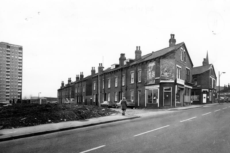 Domestic Street showing the junction with Pleasant Place in the centre in February 1980. Capel's Bakers can be seen at the end of the row.