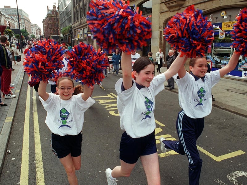 Members of Katzelite Cheerleaders put their best foot forward at the Leeds Marathon Fun Run in May 1999.