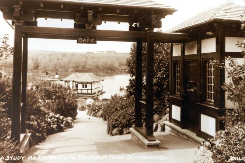 One of the entrances to Peahsolm Park with the boathouse on the lake in the distance.