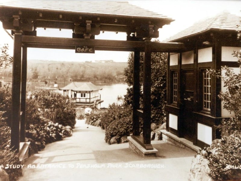 One of the entrances to Peahsolm Park with the boathouse on the lake in the distance.