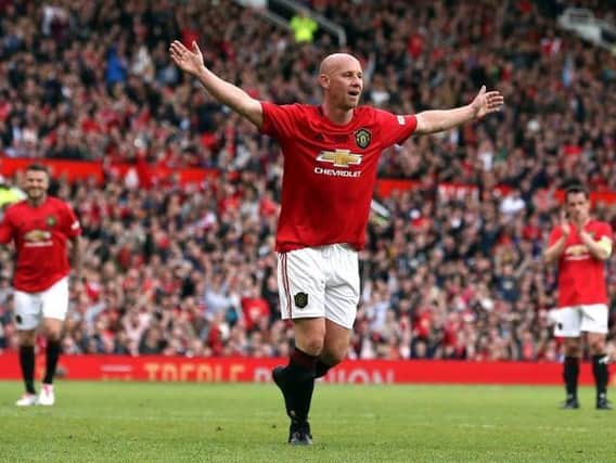 Nicky Butt celebrates in a Manchester United's legends game.