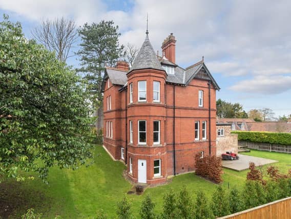 The gothic tower is a feature of this house