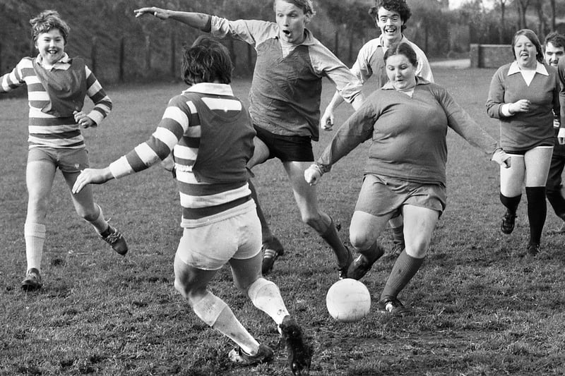 Action from a charity soccer match organised by the Railway Hotel on Moss Lane playing fields, Platt Bridge, in aid of MENCAP on Sunday 17th of October 1982.