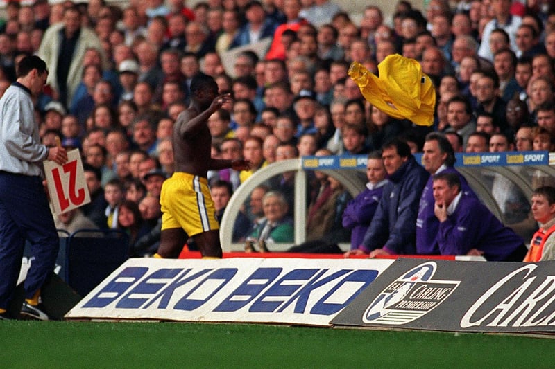 Tony Yeoboah throws his shirt at the Leeds United bench in protest of being substituted.