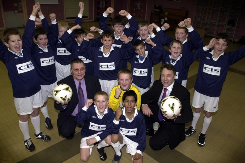 November 2002 and pupils at Hunslet Moor Primary were celebrating the delivery of a new football kit. It was provided by CIS Insurance whose representatives Bob Holdate and Roy Roebuck are pictured.