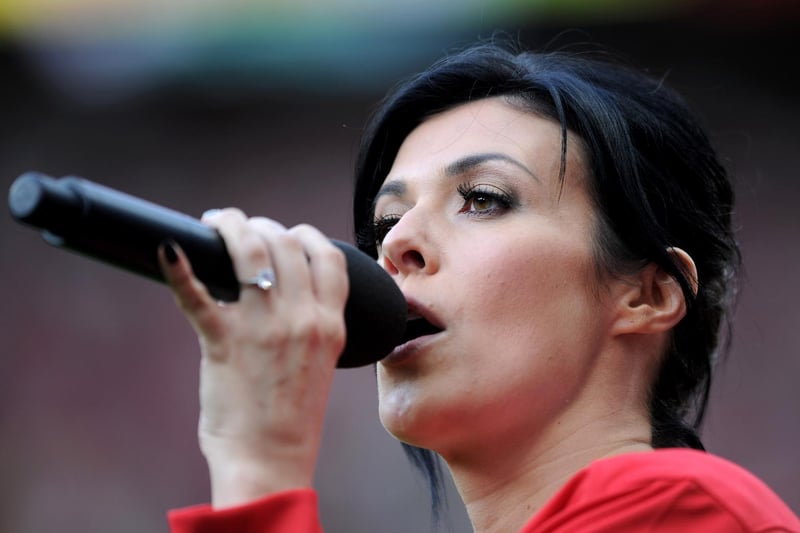 Kym entertains the crowd prior to Paul Scholes' Testimonial Match between Manchester United and New York Cosmos at Old Trafford on August 5, 2011, in Manchester.