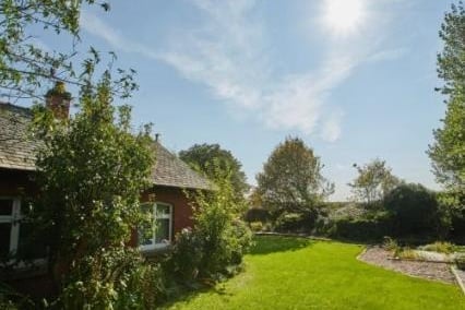 The property sits in grounds of approximately 3/4 of an acre and therefore enjoys wonderful secluded gardens to both the front and rear of the property.