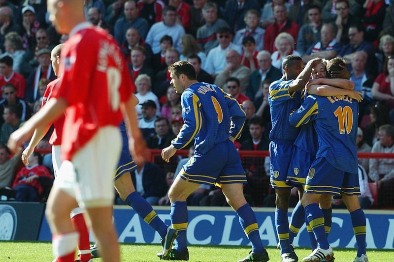 Harry Kewell celebrates with his teammates after opening the scoring on 12 minutes.