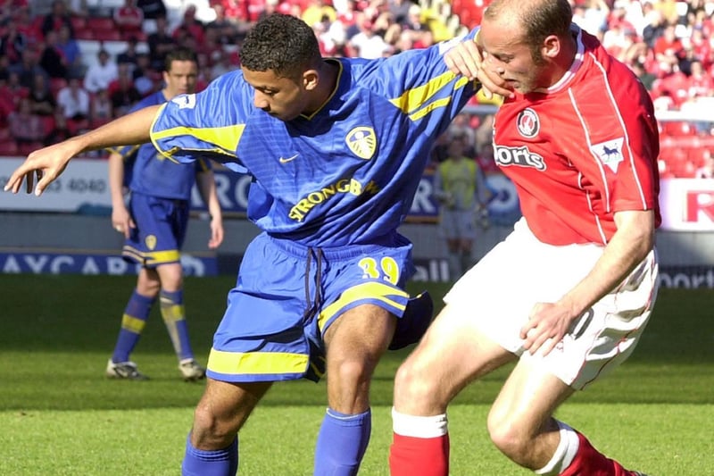 Leeds United debutant Simon Johnson battles for the ball with Charlton's Claus Jenson.