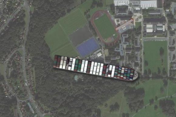 The campus is larger in scale than the ship, although the length of the Ever Given stretches across the sports fields.