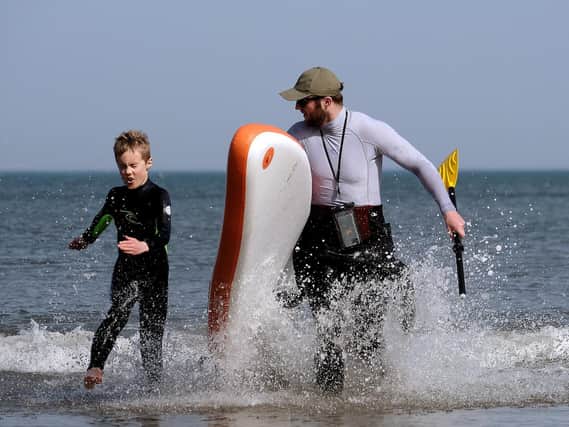 Enjoying the surf on North Bay. Picture: JPI Media/ Richard Ponter