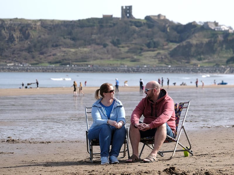 A couple enjoying the beach.