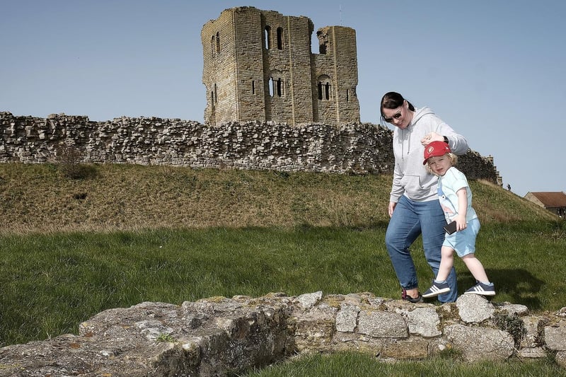 Mum Kylie Bowden and son Teddy walk around the Castle grounds.