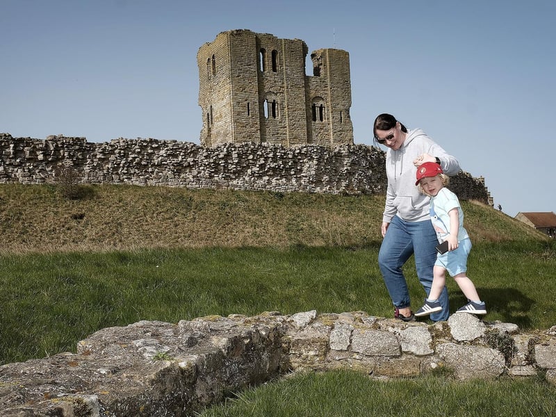 Mum Kylie Bowden and son Teddy walk around the Castle grounds.