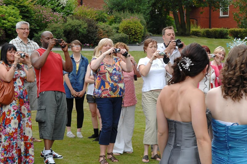 Parents turn paparazzi as they take photos at Shevington High School Leavers Ball 2010.
