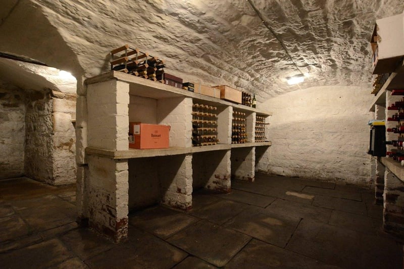 The larder also provides access down to the Victorian double barrelled-vaulted cellar, which has made an ideal space for wine storage for the current owners.