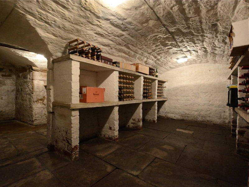 The larder also provides access down to the Victorian double barrelled-vaulted cellar, which has made an ideal space for wine storage for the current owners.