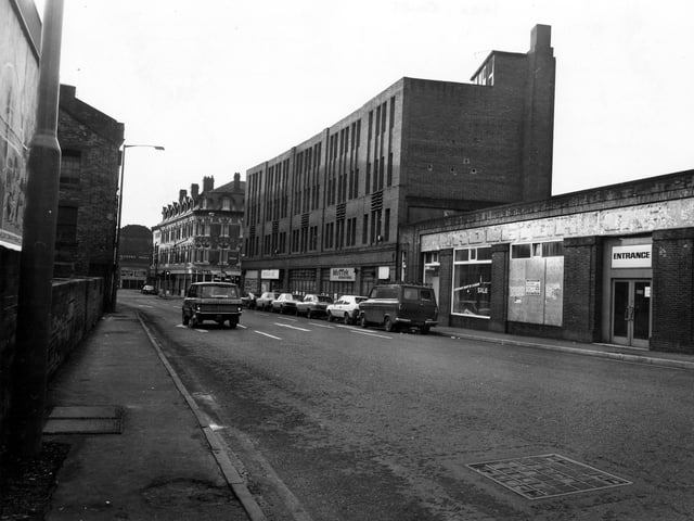 Call Lane with Queen's Hall in the distance on the left. Beyond the junction with Briggate is the Golden Lion public house. Pictured in September 1980.