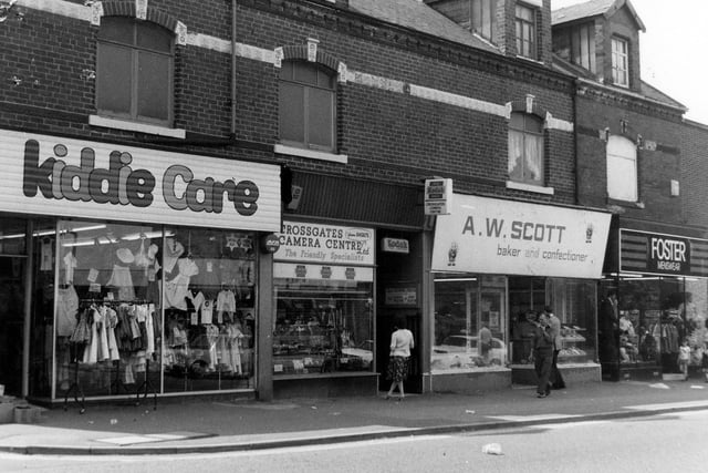 A parade of shops on Austhorpe Road in Crossgates featuring, from left, Kiddie Care children's wear, Crossgates camera centre, A.W.Scott, baker and confectioner and Foster menswear.