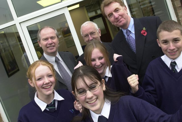 MPs George Mudie and Colin Burgon celebrate John Smeaton's excellent Ofsted report with students and acting head teacher Paul Edwards.