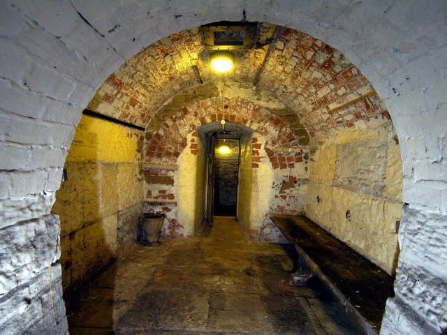 Leeds Town Hall houses a once used police station called the Bridewell. There are many cells underneath the grand building - some are even concealed under the front steps.