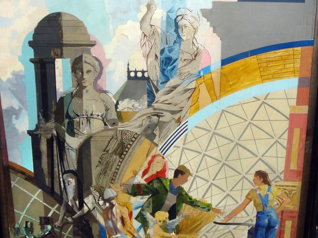 This is Cornucopia a landmark fresco by artist Graeme Willson and on public display near the Corn Exchange.