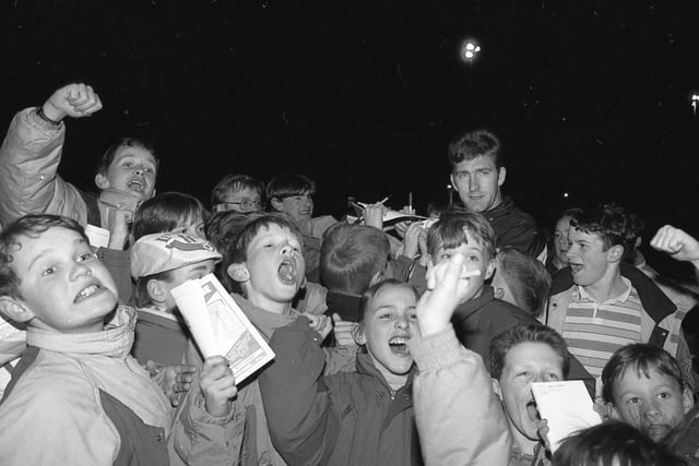 Clitheroe joined the leading 'lights' of semi-pro soccer with the historic switch-on of their brand new floodlights. Everton 'hard man' Norman Whiteside was present to mark the official switch-on, deputising for the late withdrawal of Bryan Robson who had been due to attend
