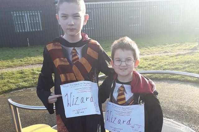 Joseph and Jacob dressed as wizards.
