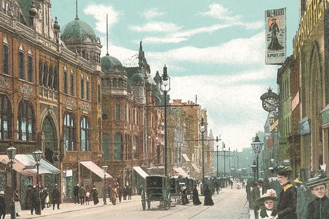 This postcard view shows Upper Briggate revitalised by the demolition of the seven slaughter houses which occupied its yards on the east side. They were replaced by the County Arcade, Queen Victoria Street and King Edward Street.